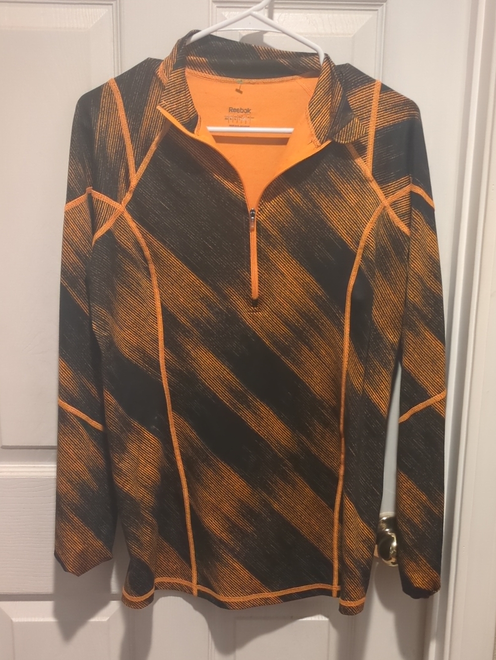 Reebok Women’s Orange and Black Quarter-Zip Performance Sweater
